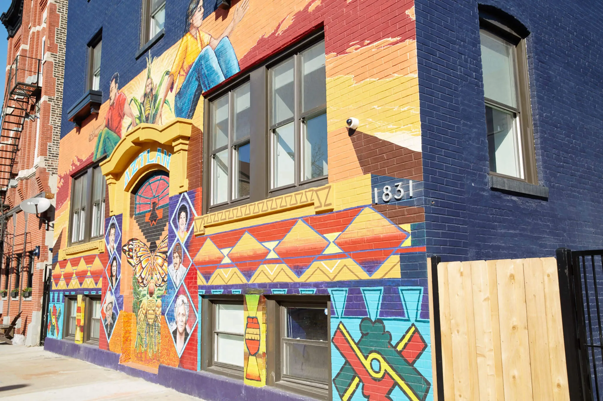 Building with colorful street mural in Pilsen